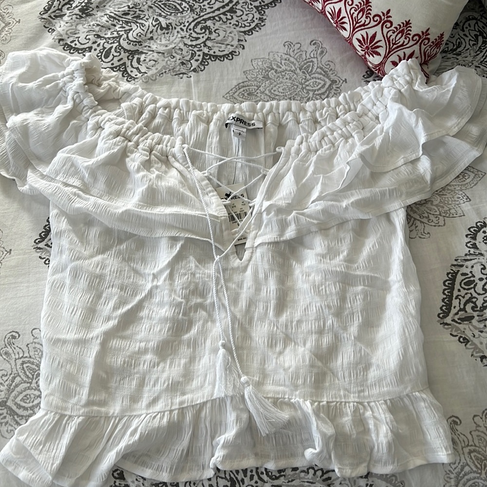 White ruffle off the shoulder top with lace up front